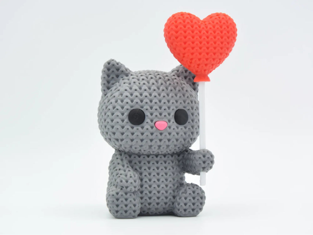 GESTRICKTE KATZE MIT HERZBALLON - VALENTINSTAG