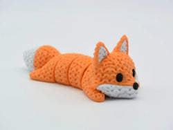 GESTRICKTER BEWEGLICH GELAGERTER FUCHS