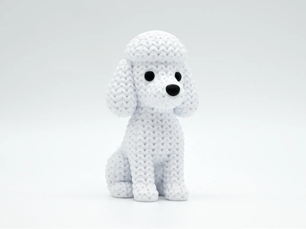 GESTRICKTER PUDELHUND