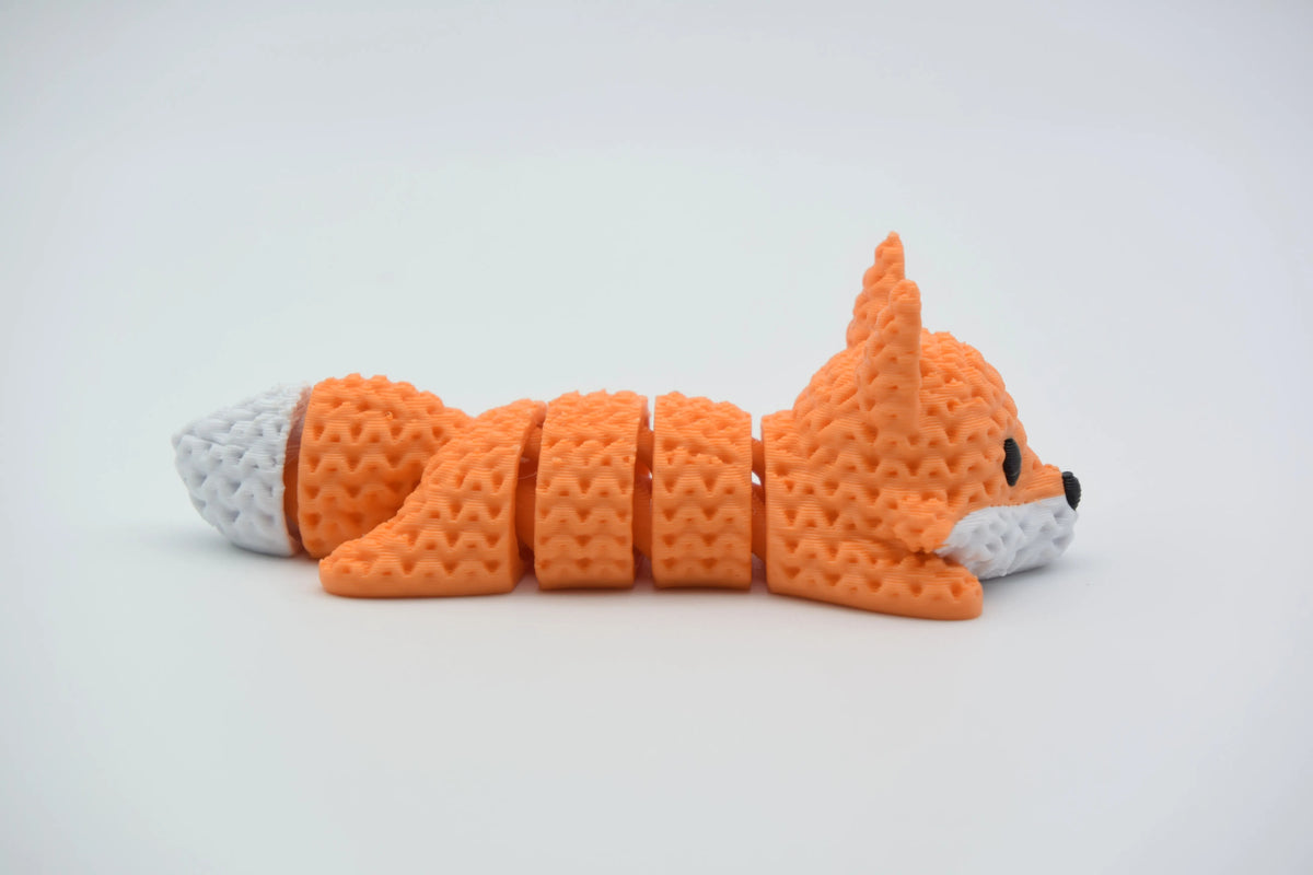 GESTRICKTER BEWEGLICH GELAGERTER FUCHS