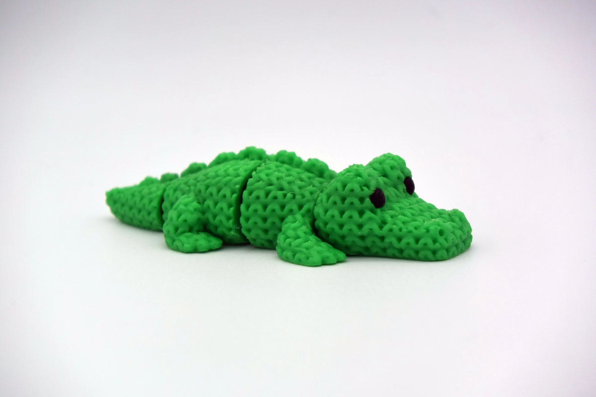 GESTRICKTES, BEWEGLICHES KROKODIL