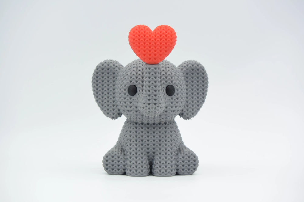 GESTRICKTER ELEFANT BLÄST HERZ – VALENTINSTAG