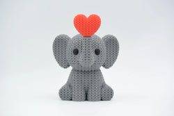 GESTRICKTER ELEFANT BLÄST HERZ – VALENTINSTAG