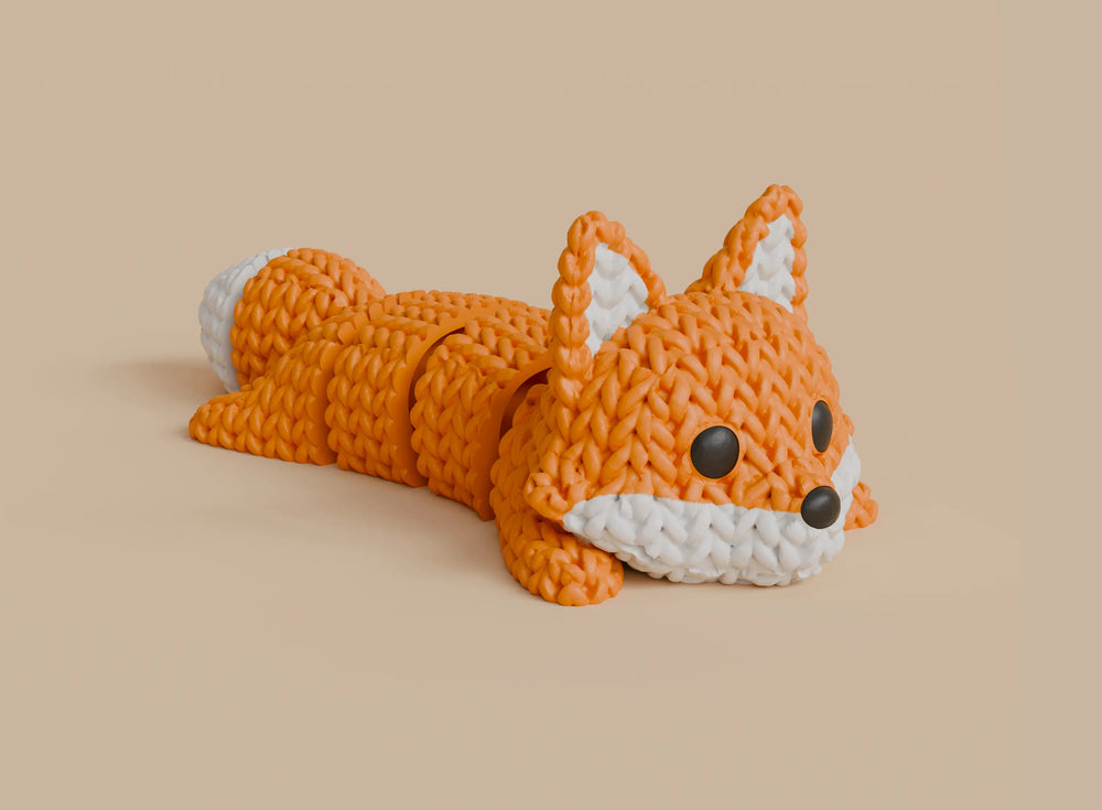 GESTRICKTER BEWEGLICH GELAGERTER FUCHS