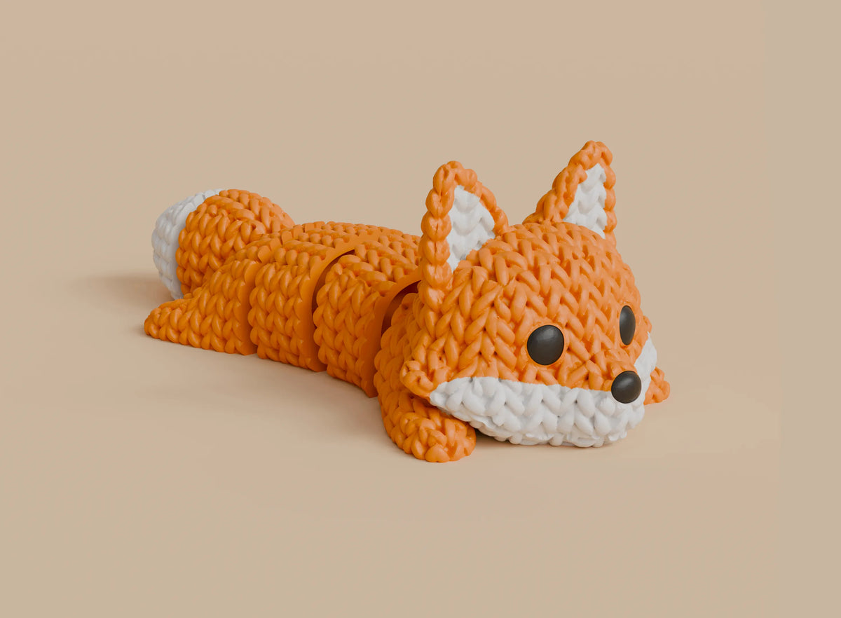 GESTRICKTER BEWEGLICH GELAGERTER FUCHS
