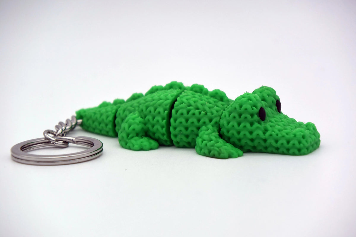 GESTRICKTES, BEWEGLICHES KROKODIL