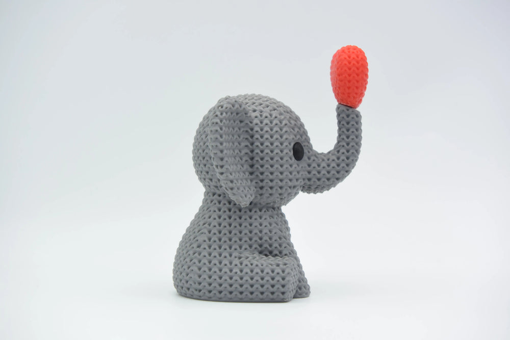 GESTRICKTER ELEFANT BLÄST HERZ – VALENTINSTAG